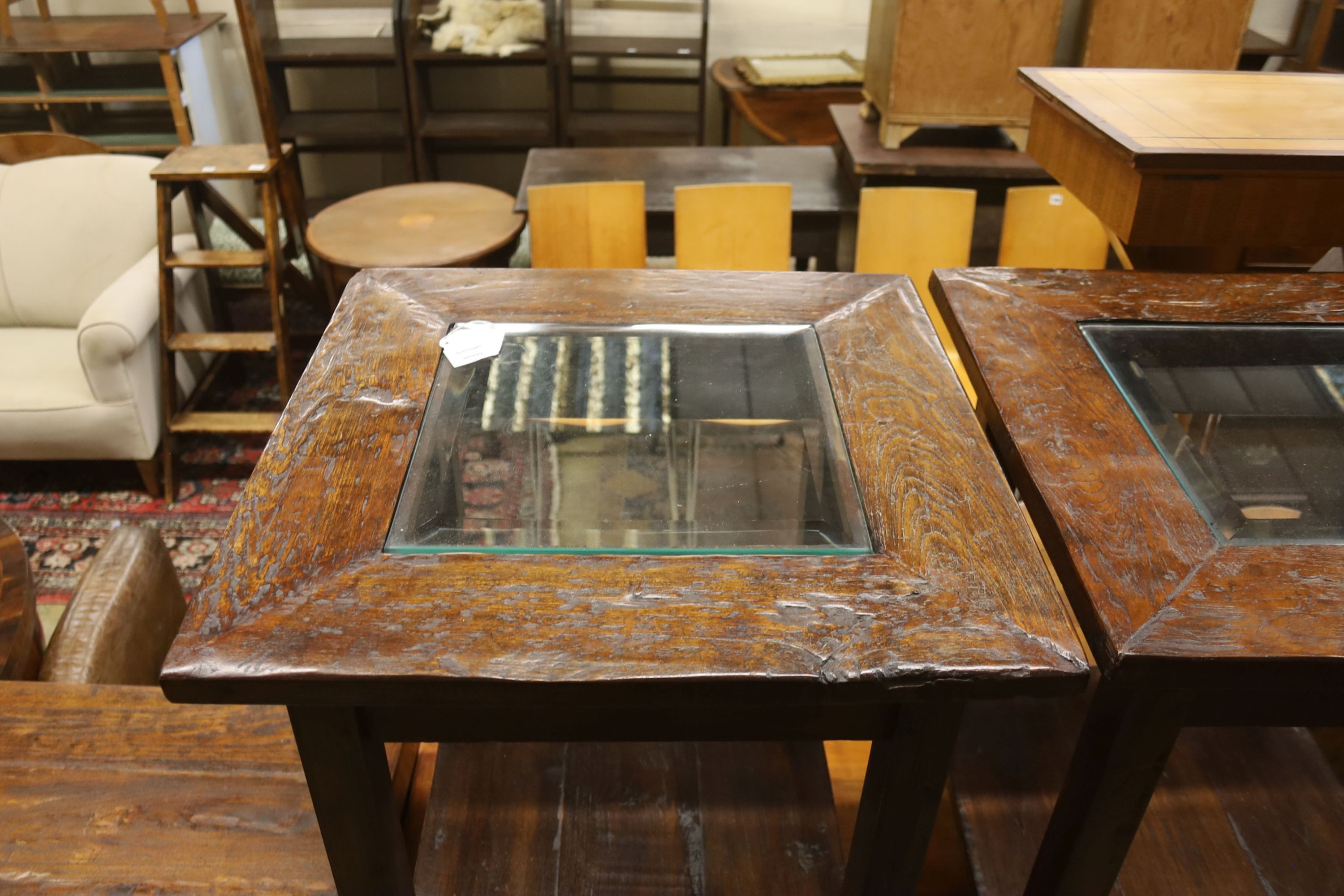 A pair of square glazed hardwood occasional tables, width 55cm, height 70cm